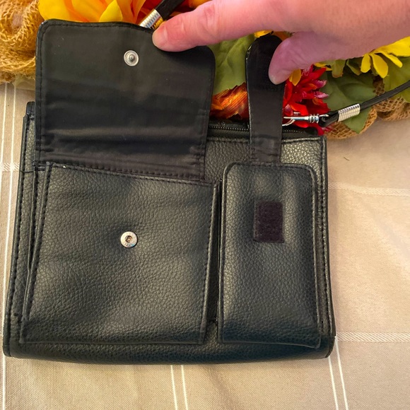 Medium Sized Black Crossbody with many options for storage. - Picture 3 of 12